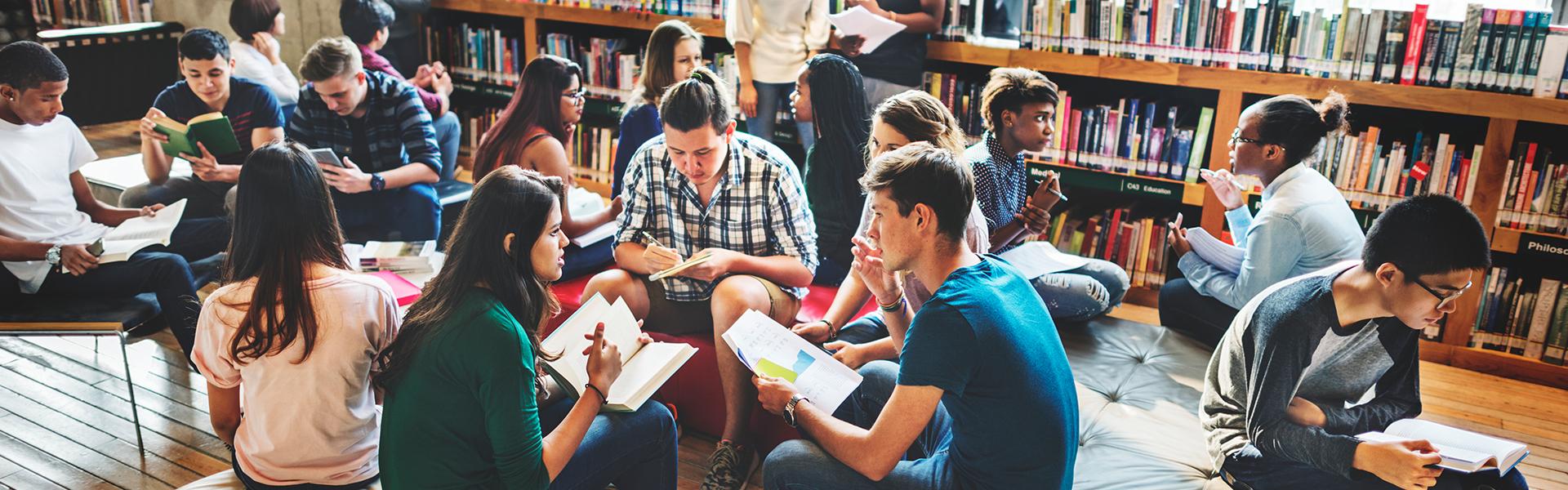 Diverse education, people reading in the library