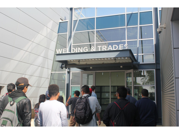 a group of lbcc Student walking into the Welding & Trades building at TTLC