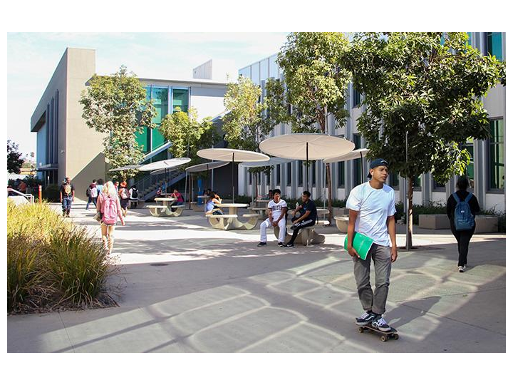 TTLC-  student life on campus- a young male student on a skateboard