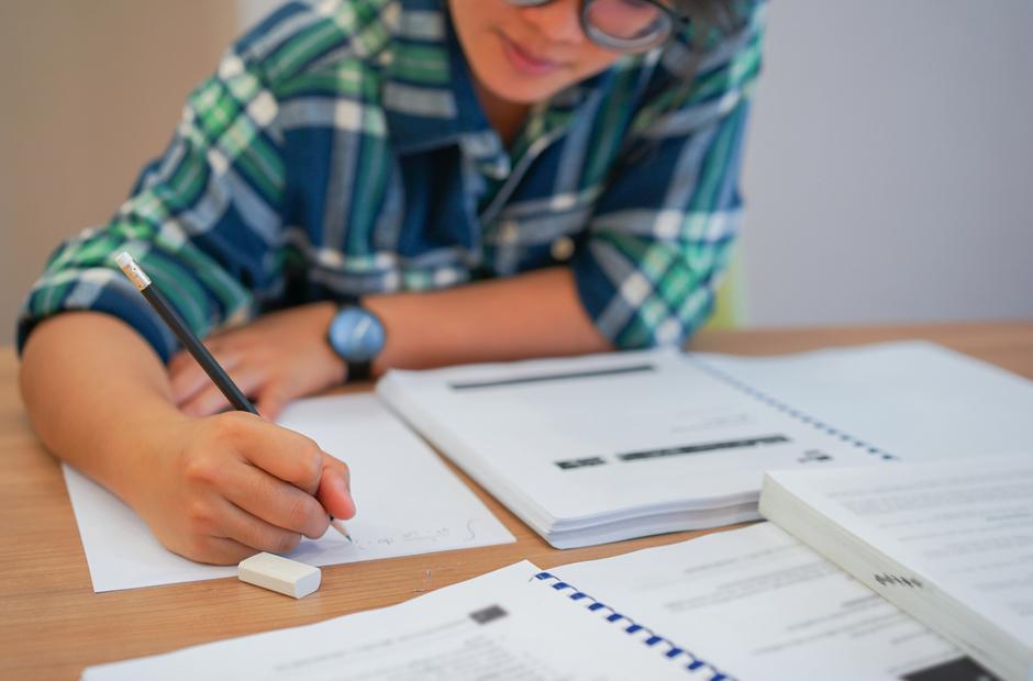 A high school student taking a test.