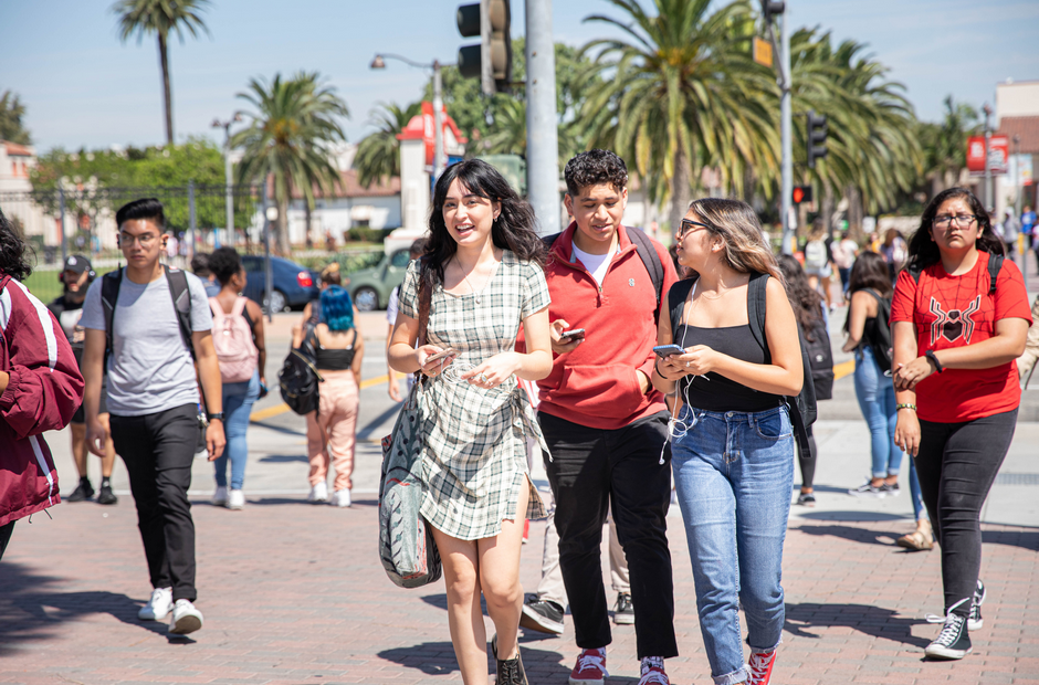 LBCC students walking across the street.