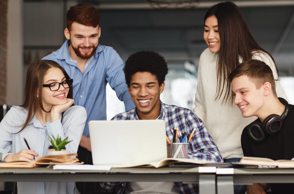 Students sitting at a desk.