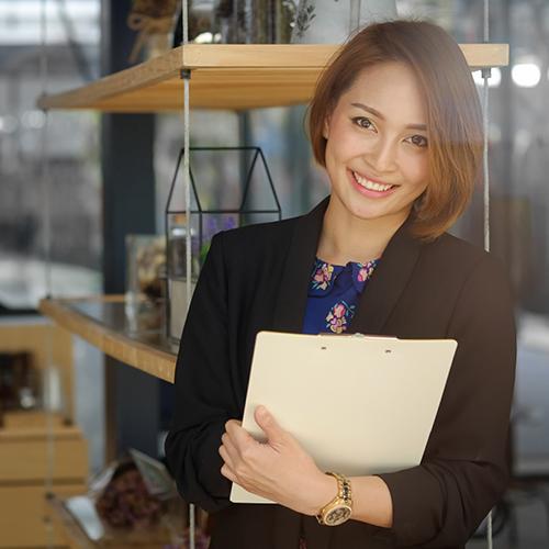 Secretary woman holding a document file and smile on face