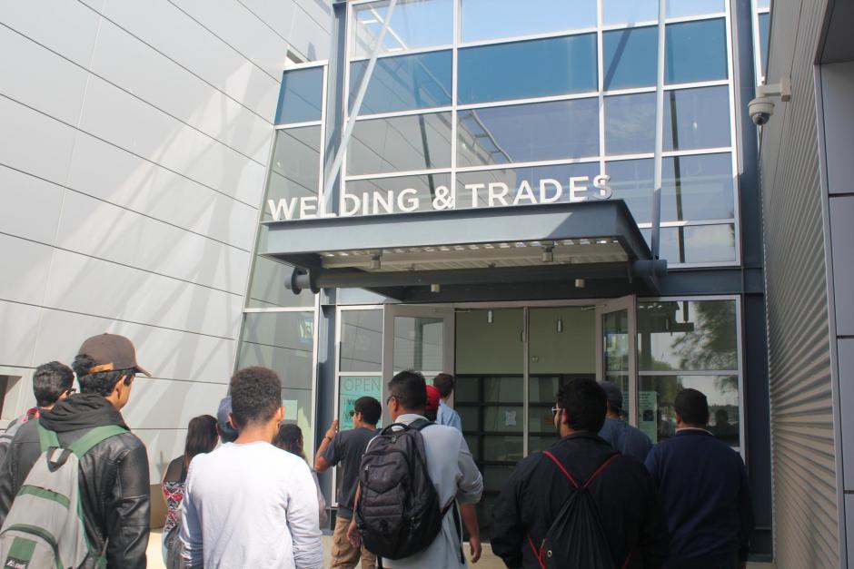 a group of lbcc Student walking into the Welding & Trades building at TTLC